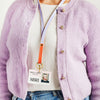 A lilac and orange leather lanyard, shown modelled with an ID card - Sbri