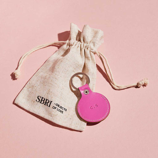 Fuchsia pink leather keyring holder for Apple AirTag, personalised with initials + Sbri gift bag