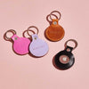 Group of leather keyring holders for Apple AirTags, made by Sbri