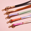 A group of five personalised leather lanyards in a mix of bright colours