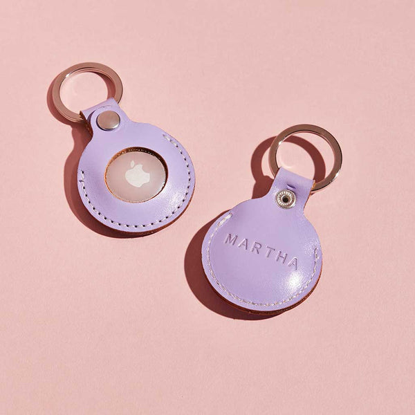 Lilac leather keyring holder for Apple AirTag, personalised with the name Martha