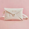 White leather bridal clutch bag with strap, personalised with name and subtle heart print